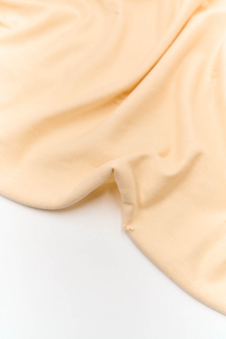 ОТРЕЗ 0,6 м (Кулирная гладь ДРАНКА С ЭФФЕКТОМ ВАРКИ ТОПЛЕНОЕ МОЛОКО/СЛИВОЧНОЕ МАСЛО 100%хб, 200 гр/кв.м, 180 см)