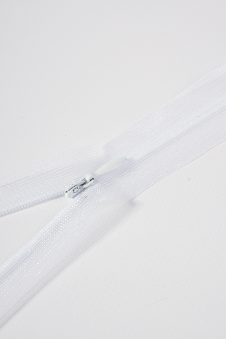 МОЛНИЯ ПОТАЙНАЯ НА ПРОЗРАЧНОЙ ТЕСЬМЕ БЕЛЫЙ 50см МОЛНИЯ ПОТАЙНАЯ НА ПРОЗРАЧНОЙ ТЕСЬМЕ БЕЛЫЙ 50см